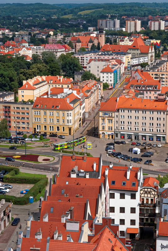 2 - Elevated aerial view of an urban square in Elbląg, Poland, featuring the Arbiter Hotel located on Plac Słowiański